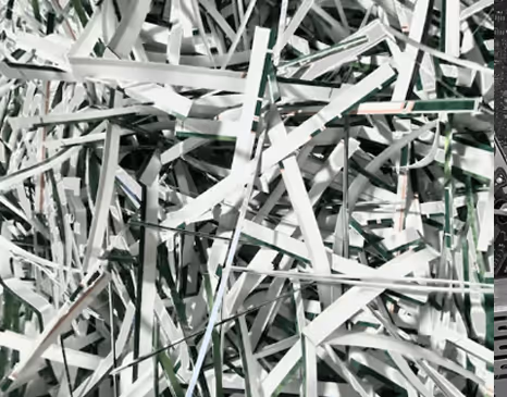 Shredded paper prepared for recycling.